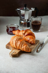 croissants with coffee and jam, tipical cotinental breakfast