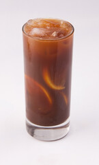 A fresh cold cocktail with coffee and orange slices