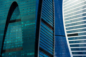 Skyscrapers, office buildings in business centre of city, modern glass architecture in commercial downtown, future design abstraction