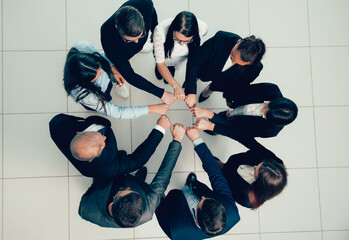 top view. group of young professionals standing in a circle