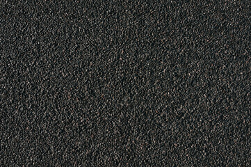 Surface grunge rough of asphalt. Seamless tarmac dark grey grainy road, Texture Background, Top view.