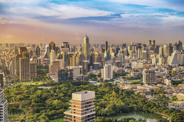 Fototapeta premium Bangkok Thailand, city skyline of skyscraper at Bangkok downtown and Lumpini Park