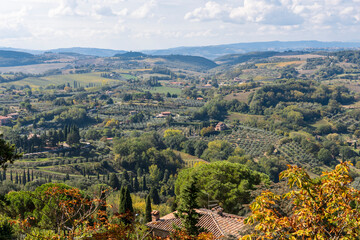 Fototapeta na wymiar Top view of the surrounding area of Montepulciano, Tuscany, Italy with fields, olive groves, vineyards and mountains