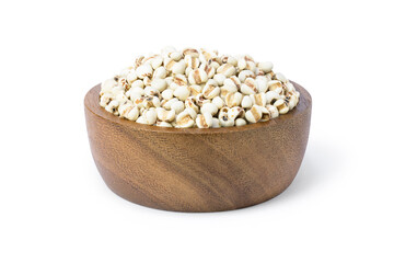 Millet in wooden bowl on white. Clipping path.
