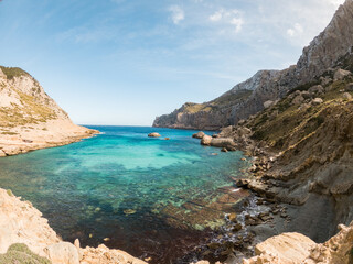 Fototapeta na wymiar Wide angle view of Cala Formentera Natural Beach in Palma de Mallorca, Balearic Islands, Spain