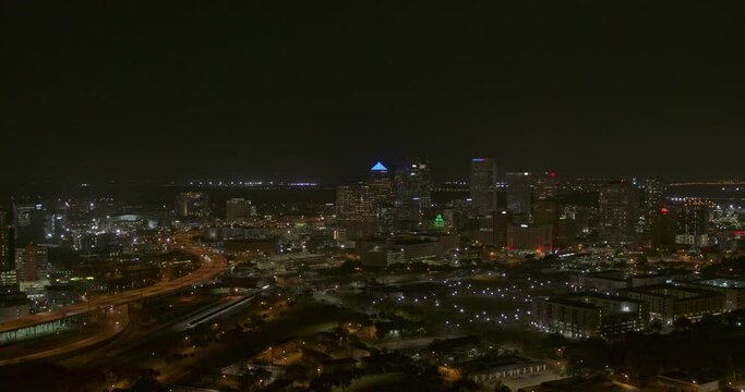 Tampa Florida Aerial v1 dolly in shot of illuminated metropolis at night - DJI Inspire 2, X7, 6k - March 2020