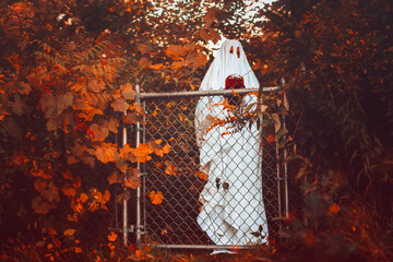 Ghosts In White Sheets Celebrating Halloween