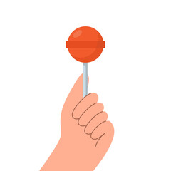 Hand holding a lollipop.