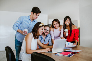 Fototapeta premium hispanic University students together with computer or laptop in Mexico Latin America