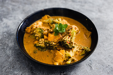 plant-based food, vegan cauliflower mango and tempeh curry