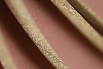 gold glitter layers pattern. golden stripes on brown texture.shiny striped background.festive abstract beautiful background