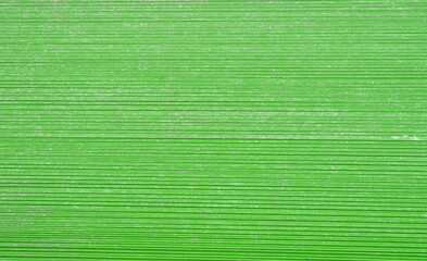 Patterns of green algae on the water. Green water. View from above. Algae. Background. Texture. Abstraction. Copy space for text
