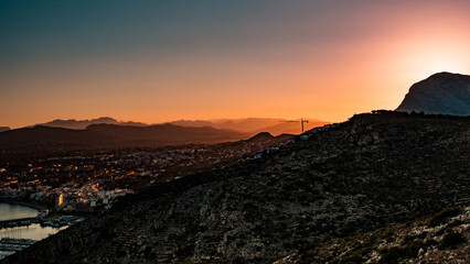 Fototapeta na wymiar Sunset over spanish coastal hills landscape