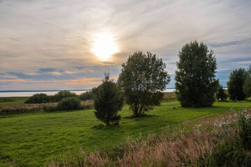 Fototapeta na wymiar Sunset on Lake Pleshcheyevo on a summer evening, Yaroslavl region, Russia.