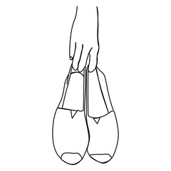 one line continuous drawing hand holding espadrille shoe
