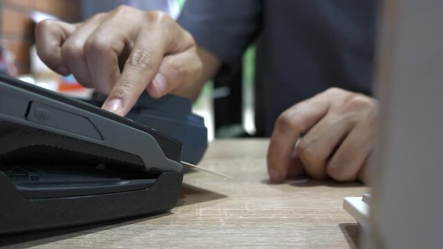 Customer using credit card for payment, credit card payment service.