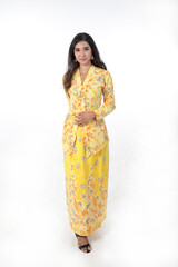 South east Asian Indian race ethnic origin woman wearing yellow kebaya baju kurung dress costume multiracial community on white background