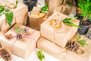 Fototapeta na wymiar Collection of christmas gift boxes with natural rustic decorations