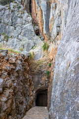 Sunny day over the rocks and the blue water in Sa Calobra, Palma de Mallorca, Balearic Islands, Spain
