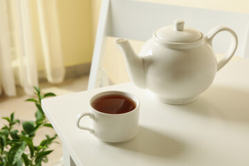Concept of breakfast with tea on white table