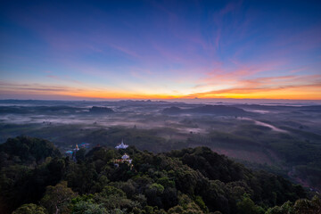Fototapeta na wymiar Landscape of beautiful sunrise at Khao Na Nai Luang Dharma Park in Thailand