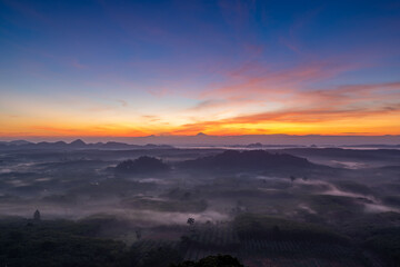 Fototapeta na wymiar Landscape of beautiful morning fog sunrise in southern of Thailand