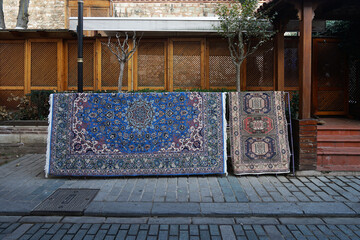 Retail display of colorful Turkish carpet rug store- Istanbul, Turkey