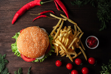 hamburger French fries on a wooden table