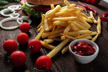 close-up of a pile of French fries on a wooden background