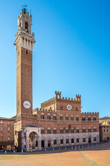 Fototapeta na wymiar View of Piazza del Campo (Campo Square)with the Mangia Tower (Torre del Mangia)in Siena - Italy