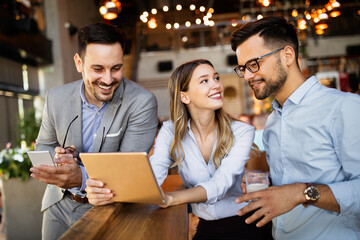 Business people having fun and chatting at workplace office