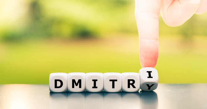 Versions of a typical Slavic name. Hand turns dice and changes the name "Dmitry" to "Dmitri".