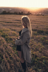 girl in the field at sunset