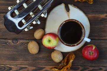 Cozy autumn evening at home with a cup of hot coffee