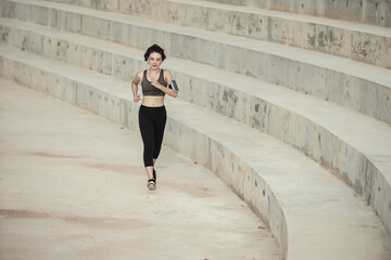 Obraz premium Asian woman healthy jogging exercise in park outdoor.