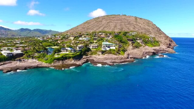 Drone footage of China Walls / Koko Kai Beach Mini Park. Honolulu, Oahu, Hawaii. Maunalua Bay, Pacific ocean. Aerial photography. Koko Head is a tuff cone. Coastal erosion.  Honolulu Volcanics