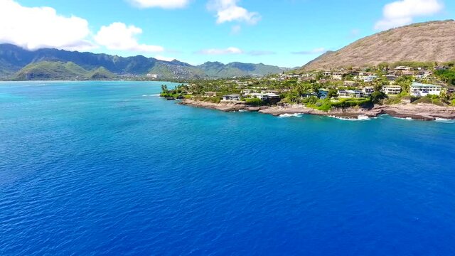 Drone footage of China Walls / Koko Kai Beach Mini Park. Honolulu, Oahu, Hawaii. Maunalua Bay, Pacific ocean. Aerial photography. Koko Head is a tuff cone. Coastal erosion.  Honolulu Volcanics