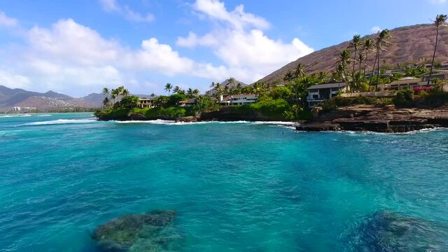 Drone footage of China Walls / Koko Kai Beach Mini Park. Honolulu, Oahu, Hawaii. Maunalua Bay, Pacific ocean. Aerial photography. Koko Head is a tuff cone. Coastal .  Honolulu Volcanics