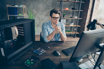 Portrait of his he nice attractive focused guy geek expert specialist experienced shark repairing...