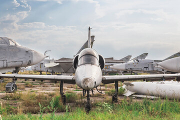 Old jet plane stands at an abandoned airfield