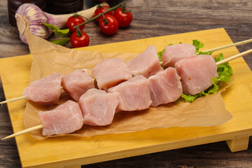 Raw pork meat skewer for grill