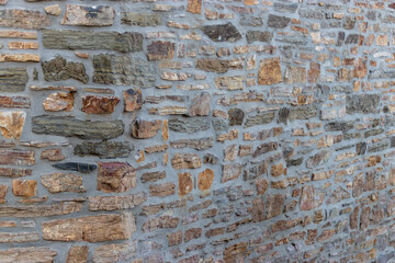 Large stone wall masonery, texture background, belgium, europe