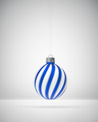 Hanging royal blue and white twisted striped Christmas ball.