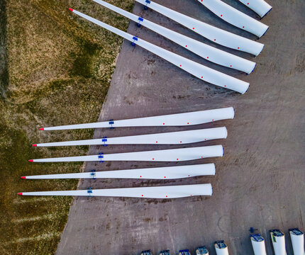 Aerial view of newly produced wind turbine wings ready for export.
