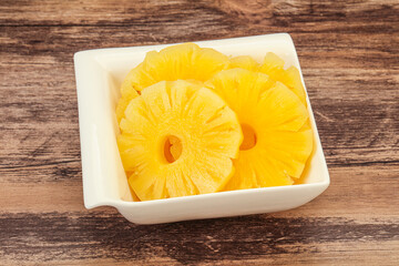 Marinated pineapple rings in the bowl