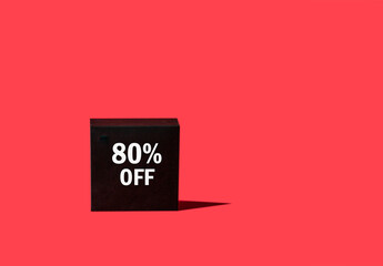 Black boxe with a precept discount on red background for Shopping and sales concept.Copy space