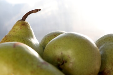 Pears mini on wooden chopping board