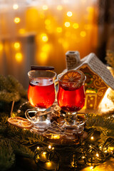 Christmas cozy still Life with glasses of warm red spicy drink