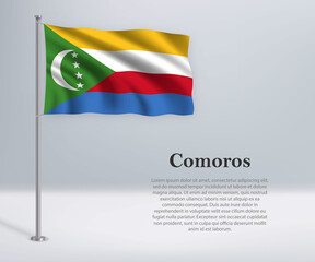 Waving flag of Comoros on flagpole. Template for independence day