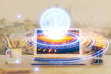 Double exposure of blockchain theme hologram and table with computer background. Concept of bitcoin...
